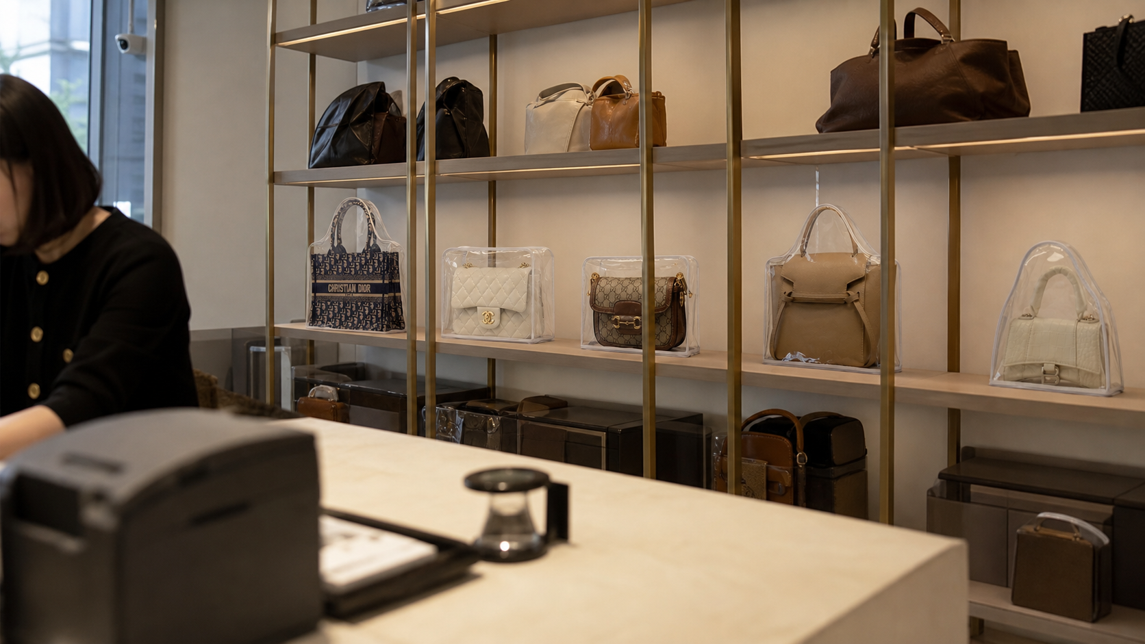 Handbag care counter in a refined resale environment